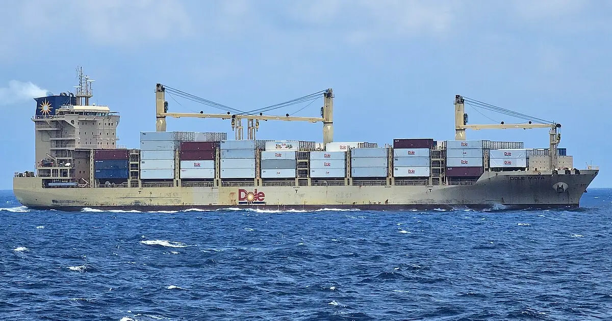 Container ship sailing on open sea