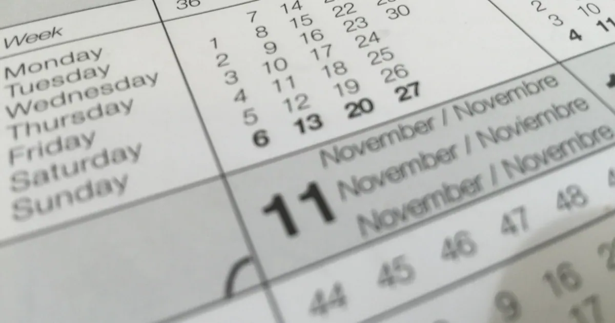 Close-up of calendar pages showing dates and weekdays