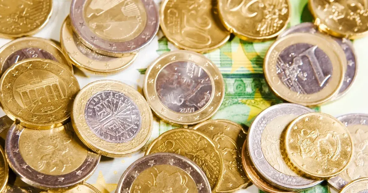 A pile of gold and silver coins