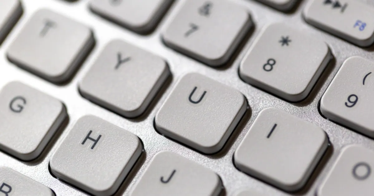 Close-up of white computer keyboard keys