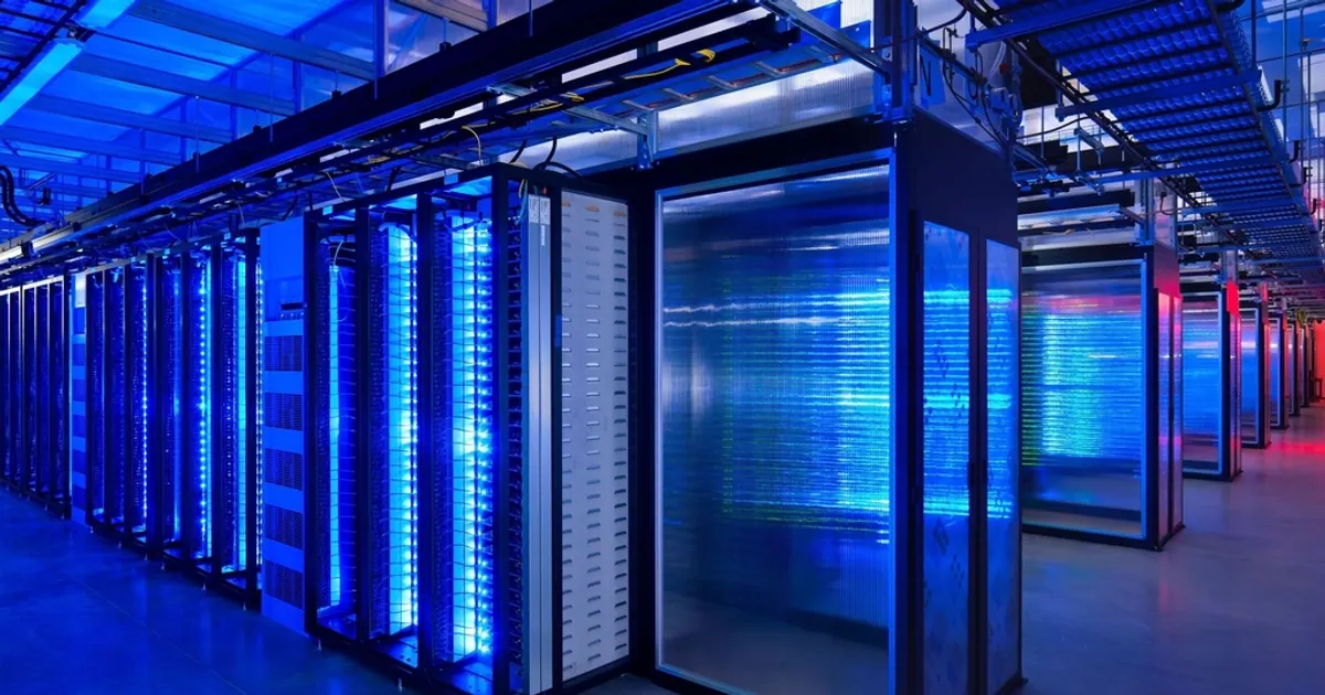 Rows of servers lit in blue in a data centre