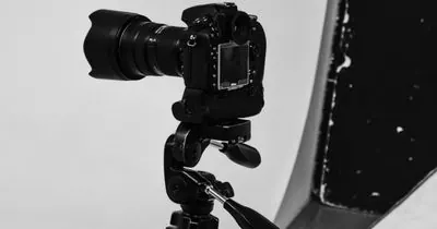 Camera mounted on a tripod